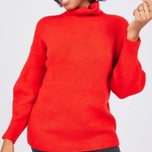 Bright orange cowl neck sweater